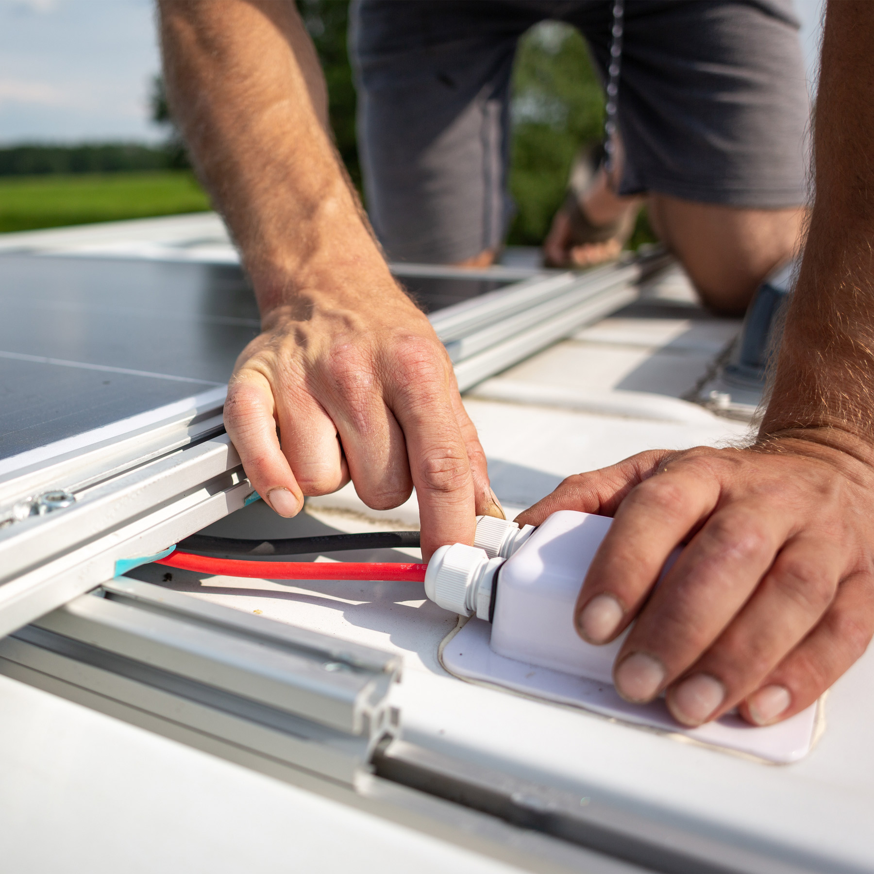 Roof-mounted RV solar panel installation
