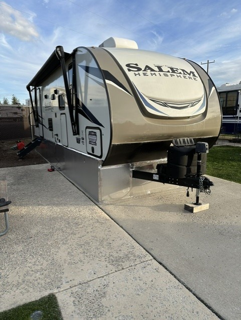 Completed RV skirting installation on a travel trailer